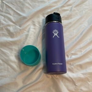 Purple Hydro Flask with teal silicon boot